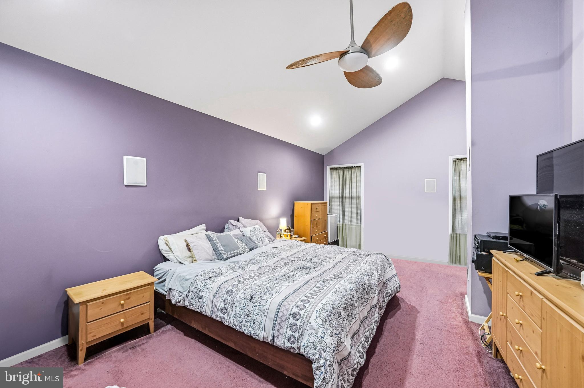 313 Ogden Station Road Wenonah, NJ 08090 - Photo 16 of 40 a bedroom with a bed and a flat screen tv