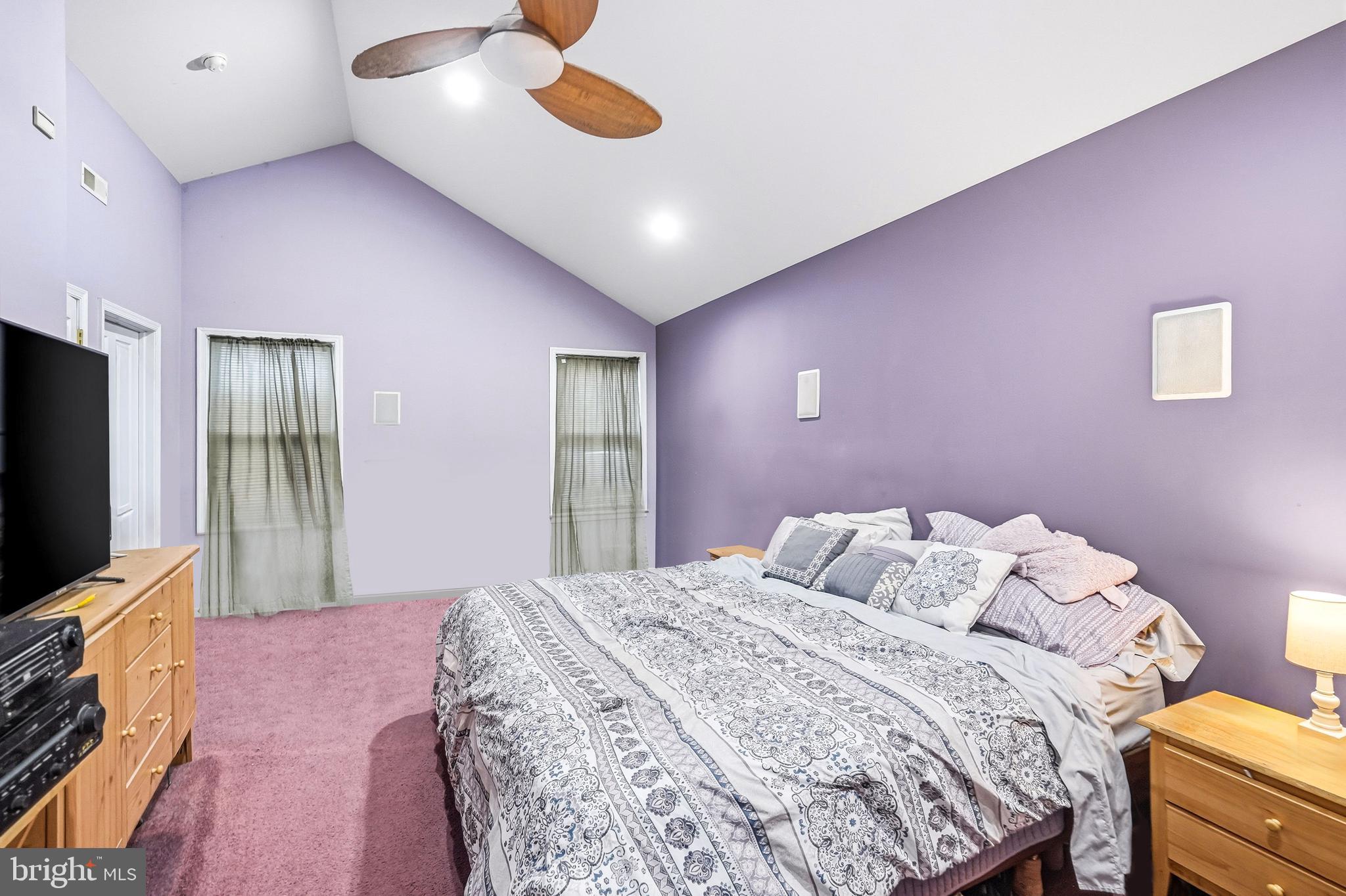 313 Ogden Station Road Wenonah, NJ 08090 - Photo 17 of 40 a bedroom with a bed and a flat screen tv