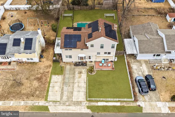 a view of swimming pool with outdoor seating