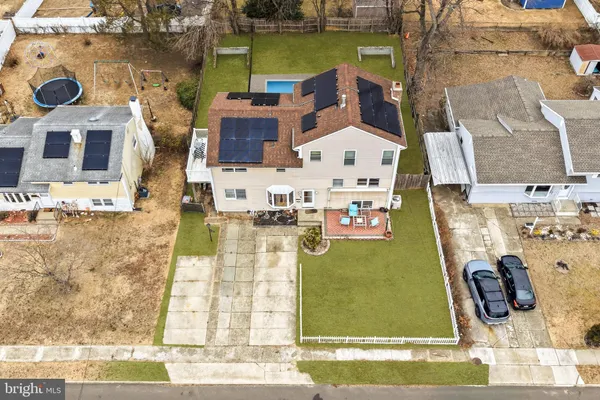 swimming pool view with a outdoor seating space