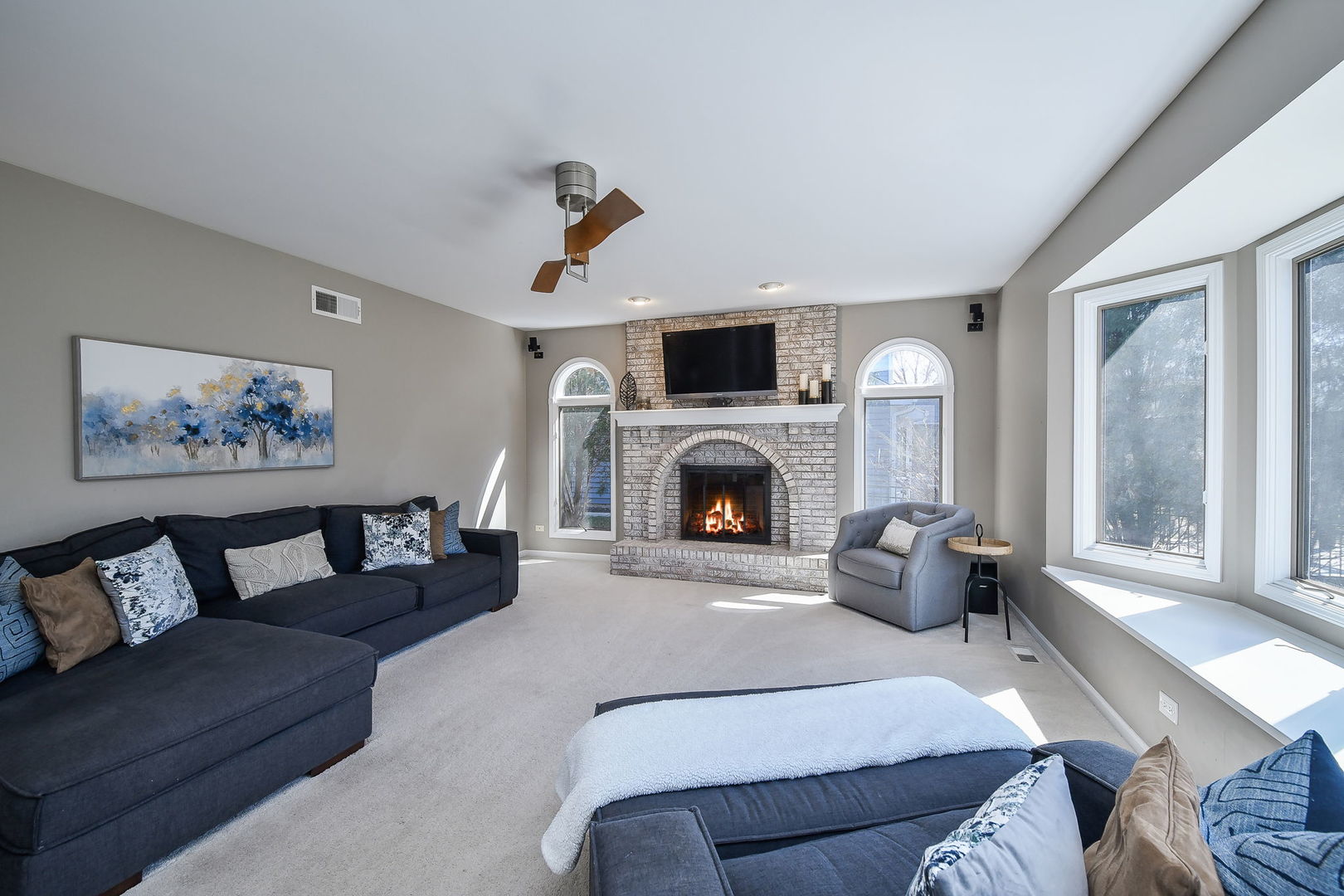 1325 Fagan Road Batavia, IL 60510 - Photo 17 of 32 a living room with furniture a window and a fireplace