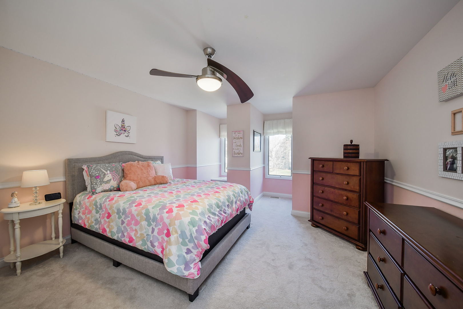 1325 Fagan Road Batavia, IL 60510 - Photo 25 of 32 a bedroom with a bed and a chandelier