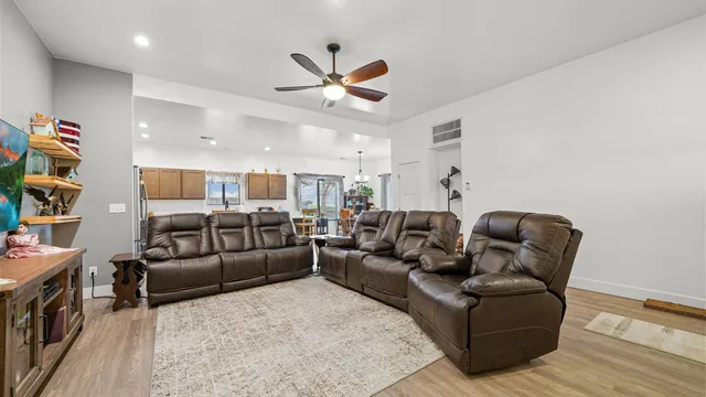 a living room with furniture and a couch