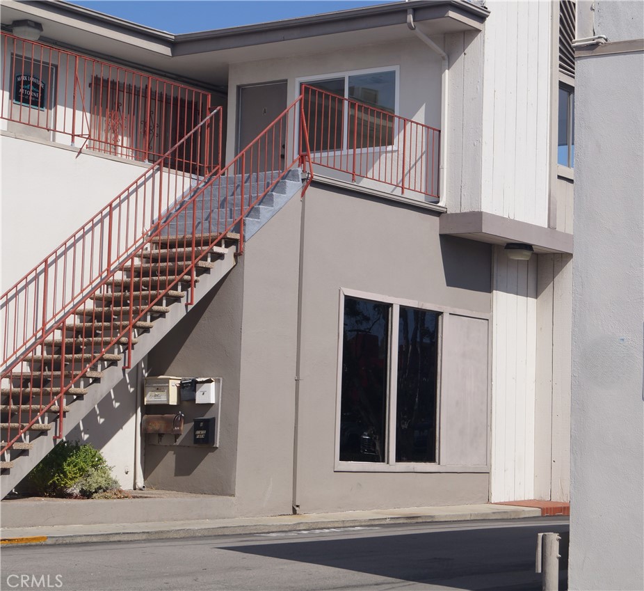 1501 North Sepulveda Boulevard, Unit A Manhattan Beach, CA 90266 - Photo 2 of 5 a view of entryway and hall with wooden floor