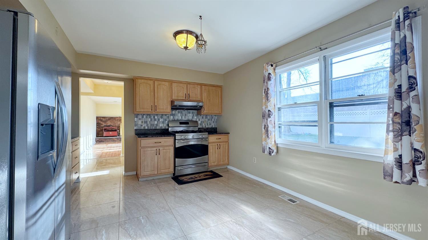 9 Stratford Circle Edison, NJ 08820 - Photo 20 of 38 a kitchen with a refrigerator and a stove