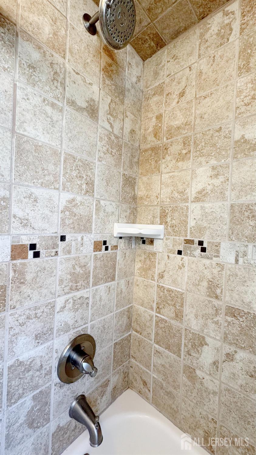 9 Stratford Circle Edison, NJ 08820 - Photo 26 of 38 a bathroom with a shower