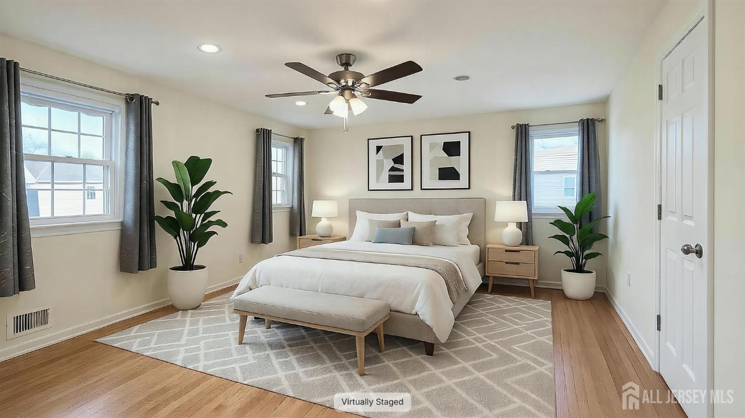 9 Stratford Circle Edison, NJ 08820 - Photo 27 of 38 a bedroom with a large bed chandelier and a window