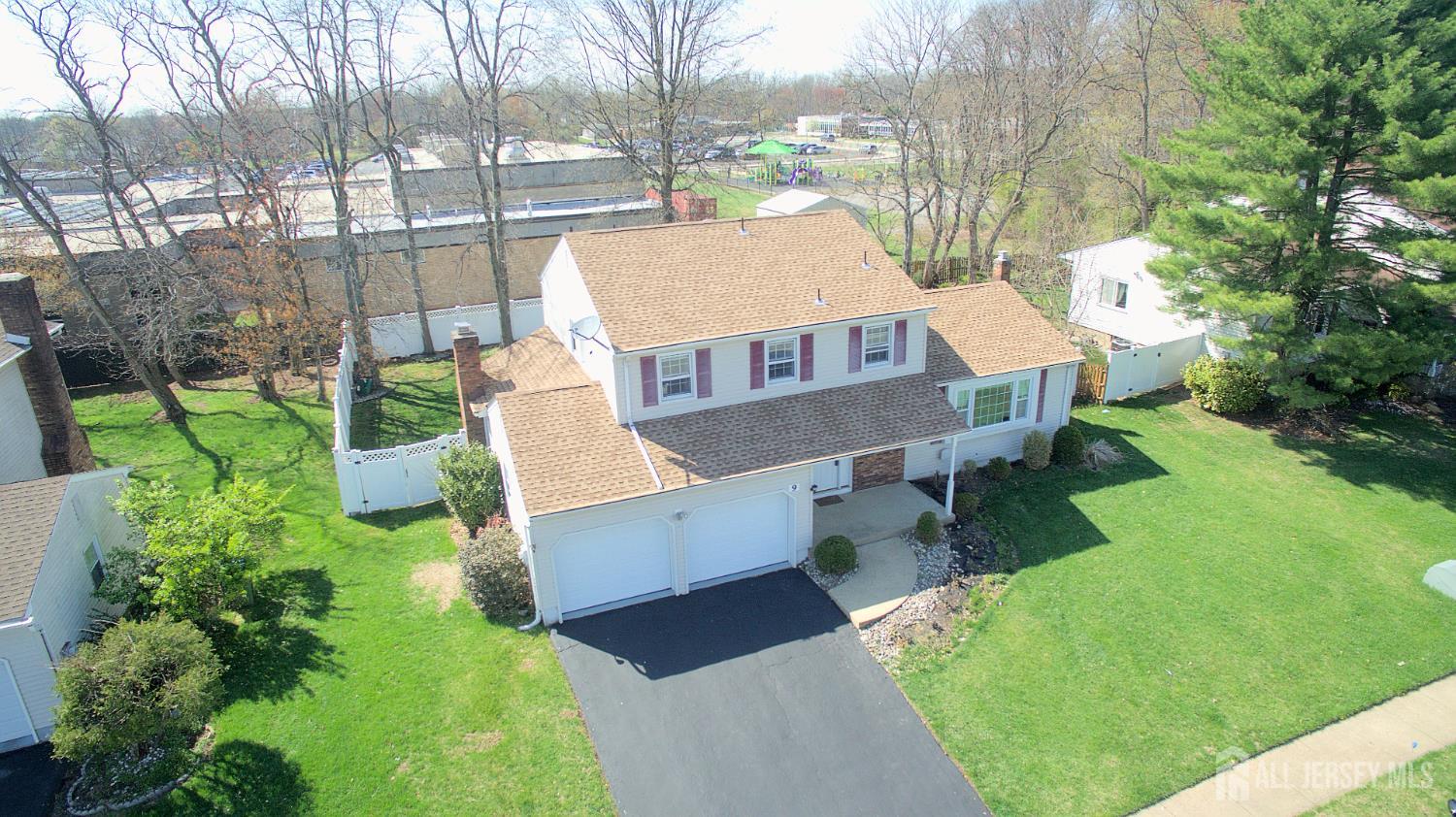 9 Stratford Circle Edison, NJ 08820 - Photo 3 of 38 a view of a house with a yard and sitting area