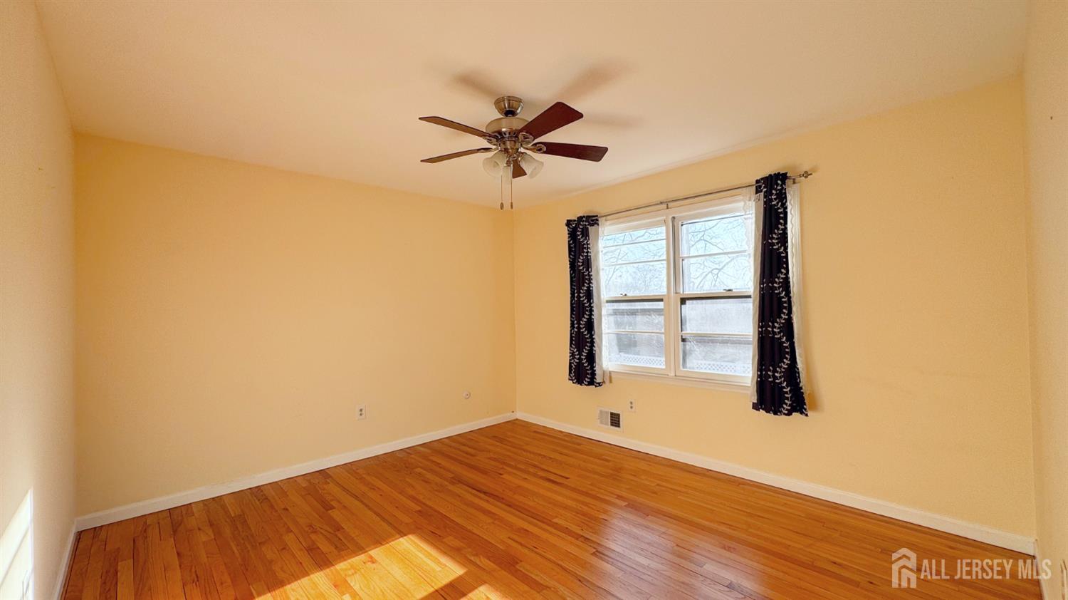 9 Stratford Circle Edison, NJ 08820 - Photo 31 of 38 a bedroom with a bed and a window