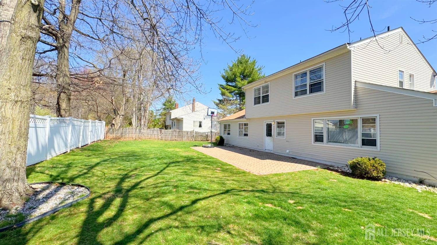 9 Stratford Circle Edison, NJ 08820 - Photo 38 of 38 a front view of house with yard and trees around