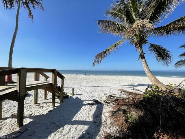 a view of a chairs and table in the patio