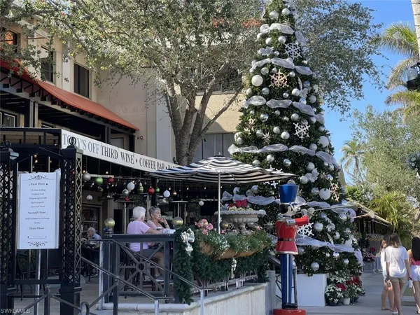 a view of street with sitting area