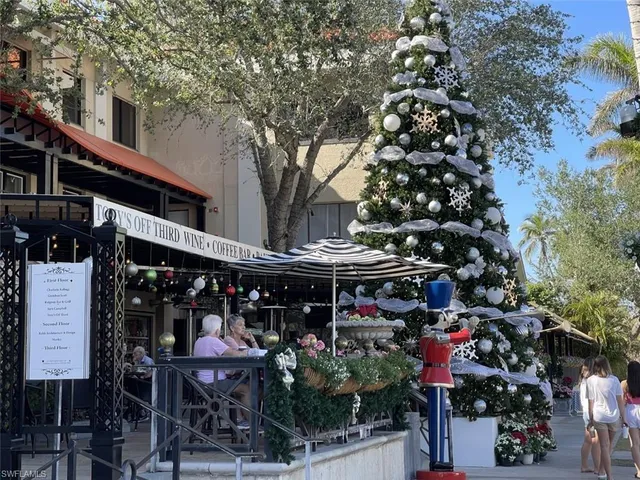a view of street with sitting area