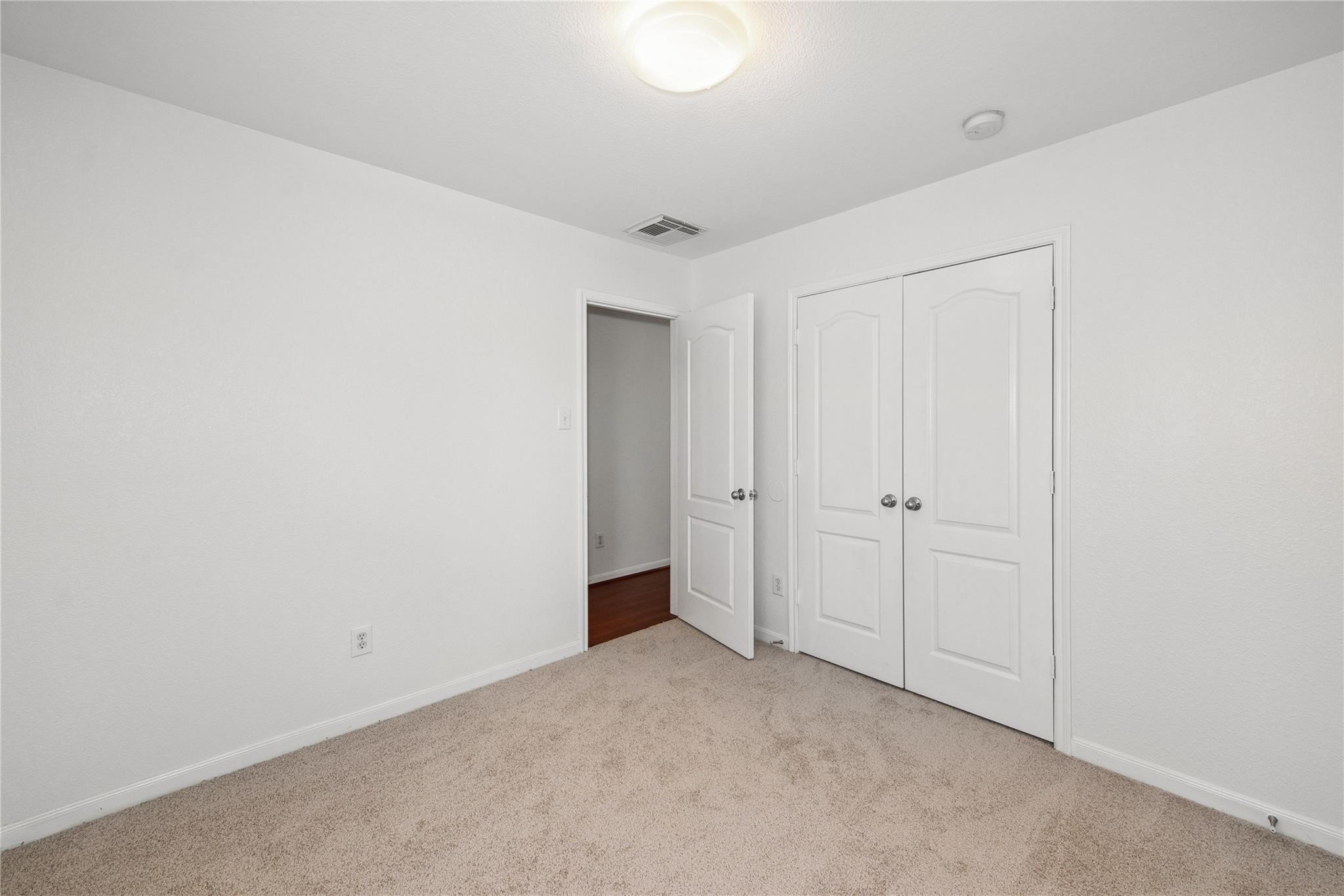 16310 Chandler Ridge Lane Cypress, TX 77429 - Photo 19 of 25 a view of an empty room