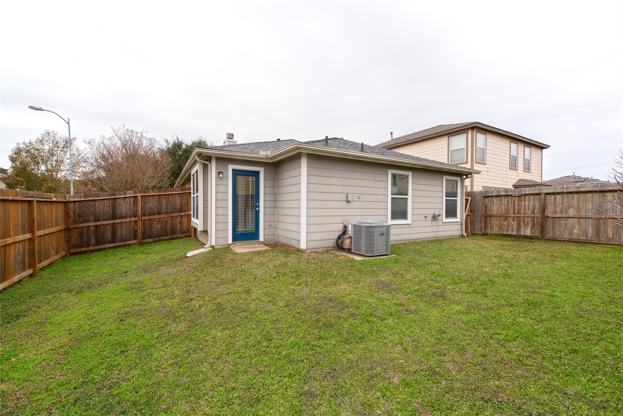 16310 Chandler Ridge Lane Cypress, TX 77429 - Photo 21 of 25 a front view of a house with a garden