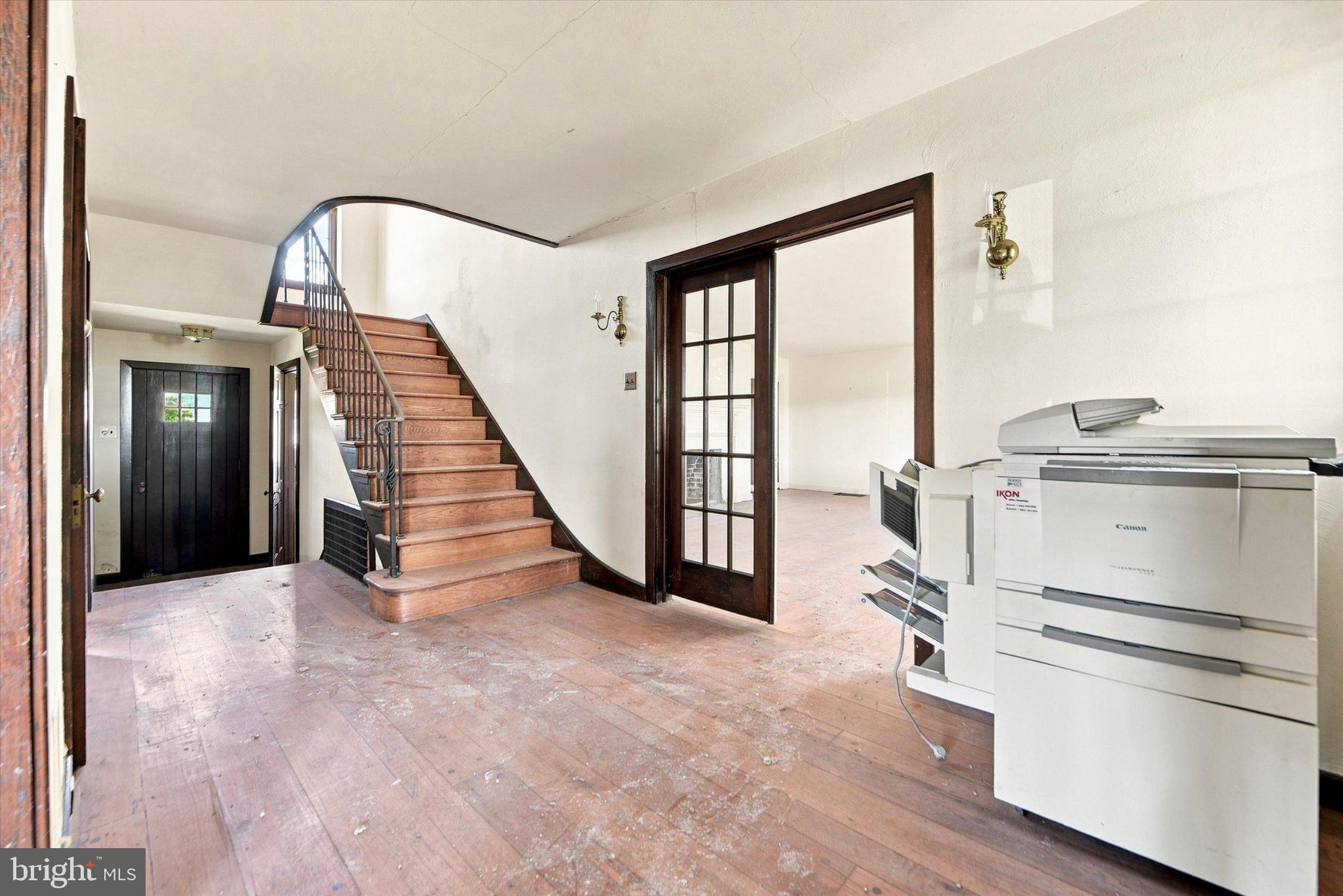 949 Swedesford Road Exton, PA 19341 - Photo 11 of 39 Grand foyer and original iron stair railing