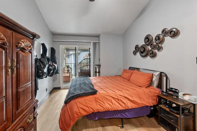 a bedroom with a bed and a walk in closet