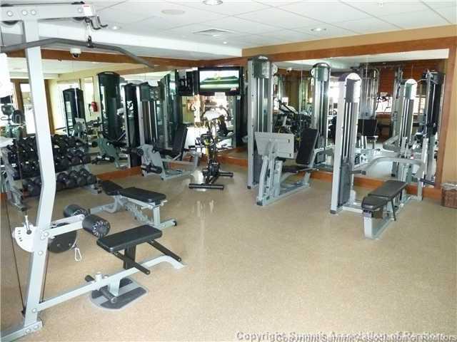 373 Timbertrail Road Breckenridge, CO 80424 - Photo 16 of 24 a room with lots of chairs and mirrors