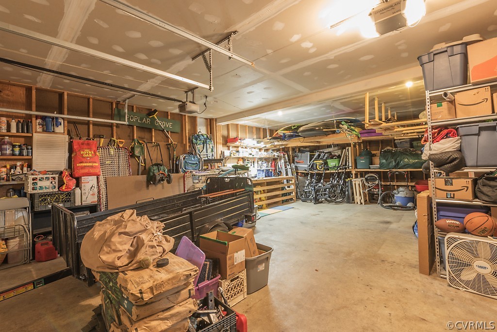 13505 West Poplar Grove Road Midlothian, VA 23112 - Photo 43 of 44 HUGE 4 car garage is the perfect storage place for