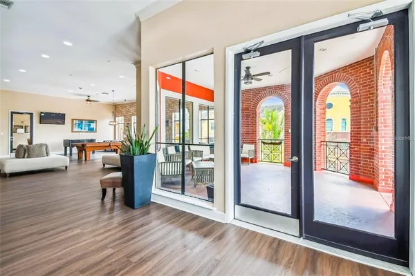 a view of a livingroom with furniture and window