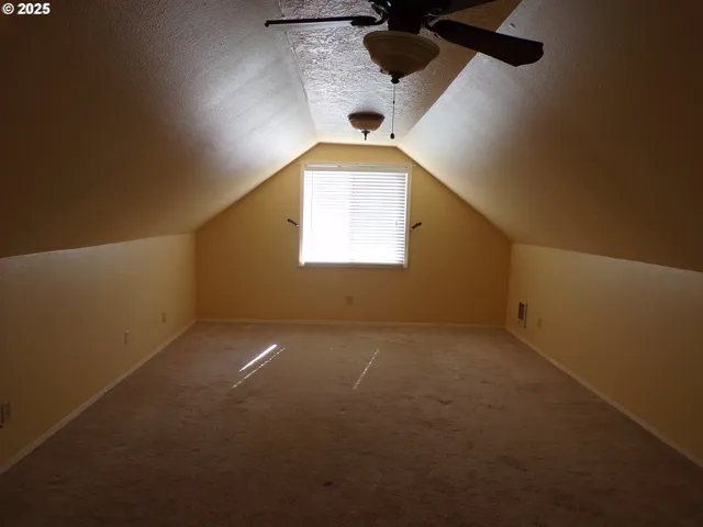 a view of a window in an empty room
