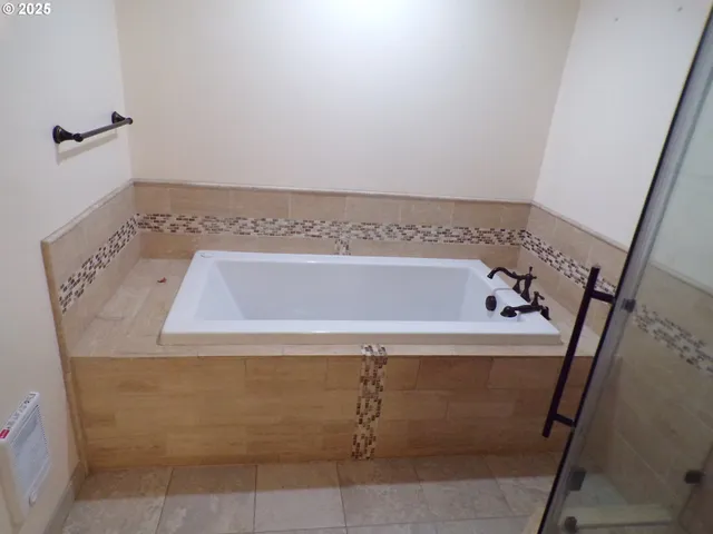 a bathroom with a bathtub
