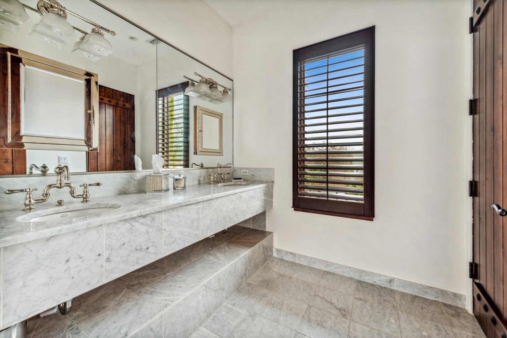 240 Spring Avenue Naperville, IL 60540 - Photo 15 of 43 a bathroom with a double vanity sink and a mirror