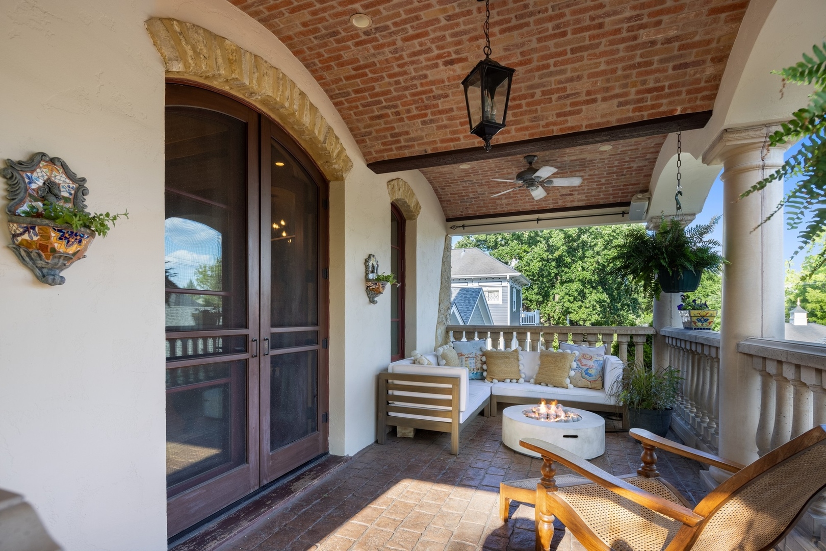 240 Spring Avenue Naperville, IL 60540 - Photo 30 of 43 a balcony with furniture and a potted plant
