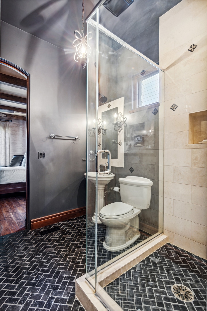 240 Spring Avenue Naperville, IL 60540 - Photo 31 of 43 a bathroom with a toilet and a shower