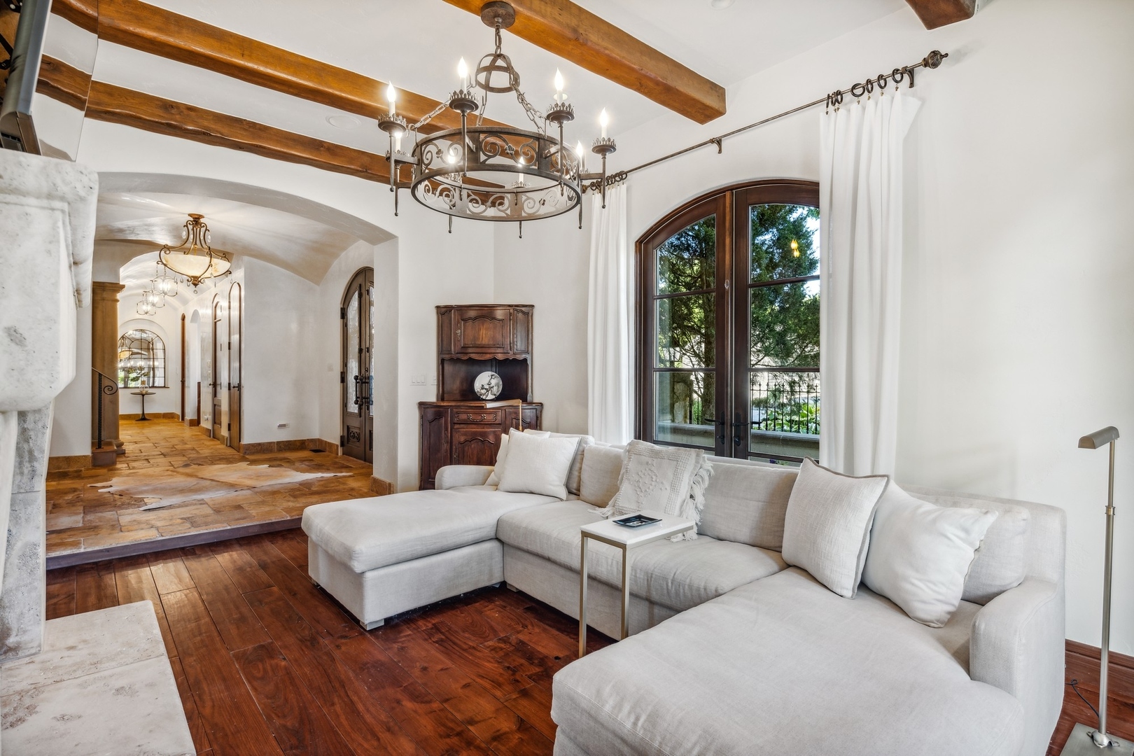 240 Spring Avenue Naperville, IL 60540 - Photo 7 of 43 a living room with furniture and a chandelier