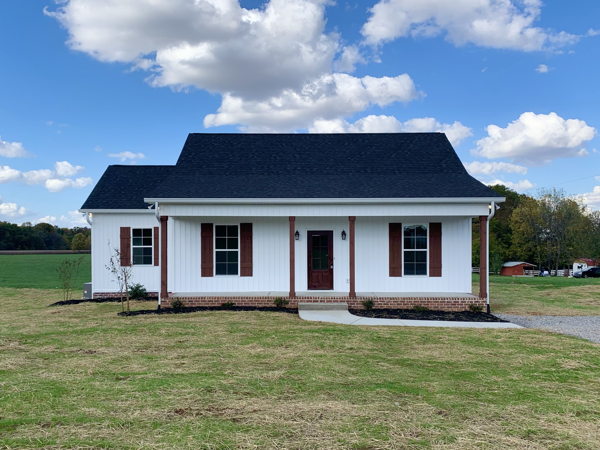 4764 Boyd Holland Road Springfield, TN 37172 - Photo 1 of 4 a front view of a house with garden