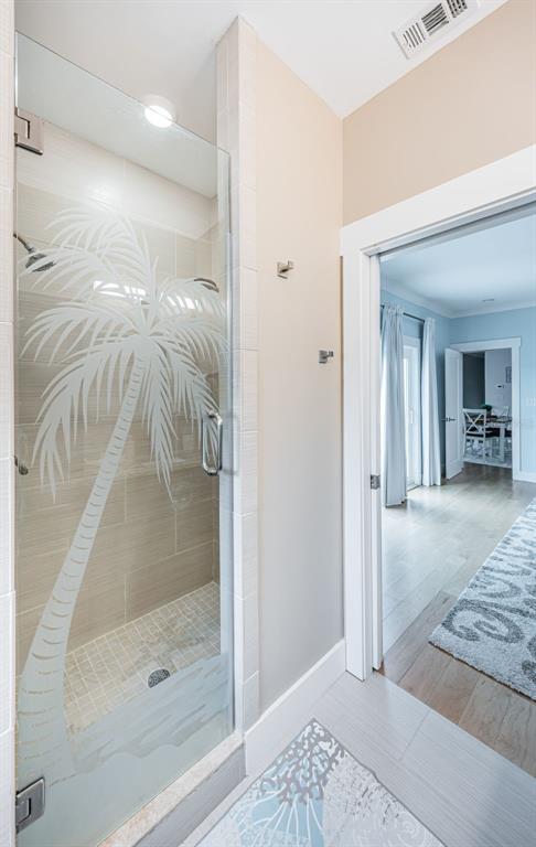 16109 3rd Street East Redington Beach, FL 33708 - Photo 16 of 25 a bathroom with a shower and a sink