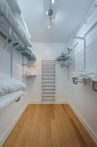 a view of a room with racks on the wall