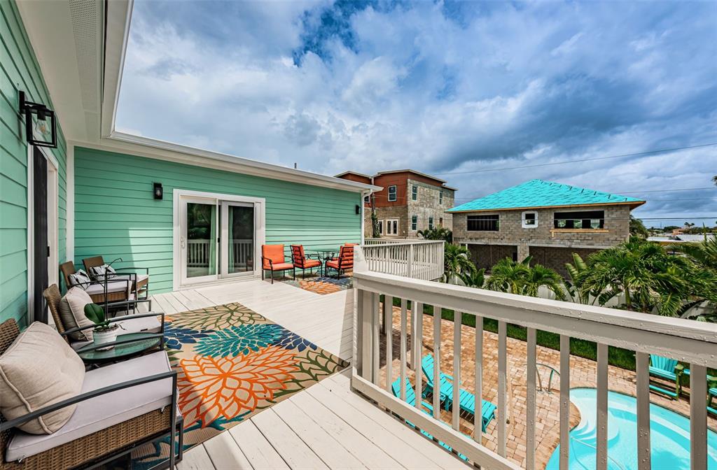16109 3rd Street East Redington Beach, FL 33708 - Photo 21 of 25 a view of a house with wooden deck