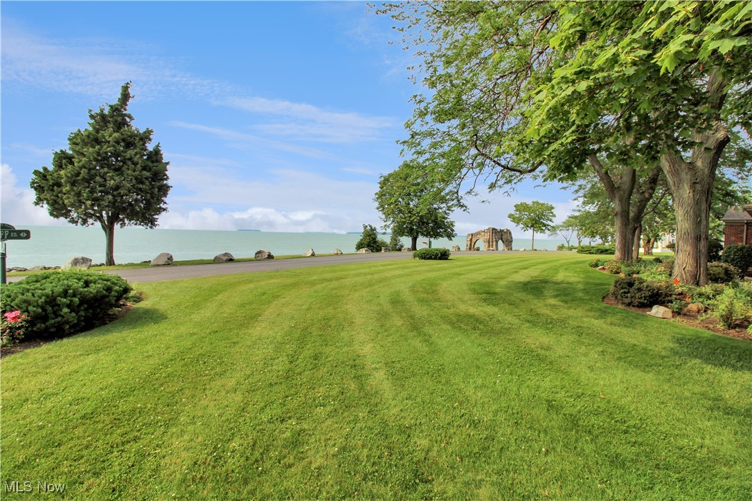 4520 East Cliff Road Port Clinton, OH 43452 - Photo 40 of 50 View of green lawn with a water view