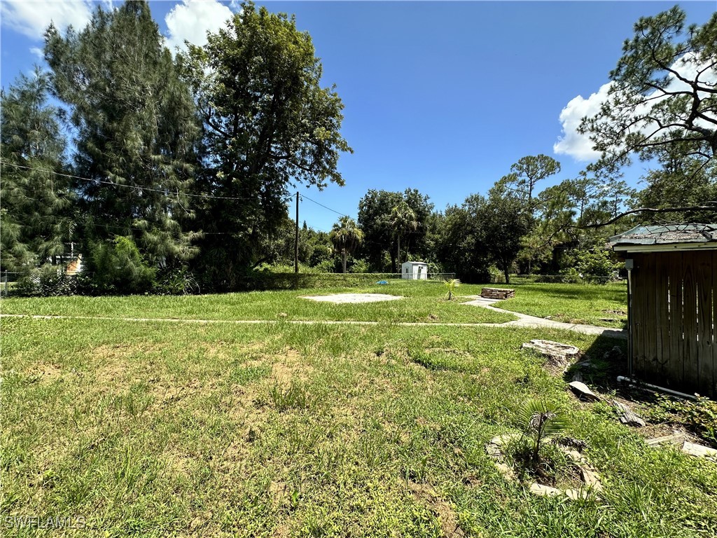 818 Sheldon Avenue Lehigh Acres, FL 33936 - Photo 42 of 43 a view of a garden