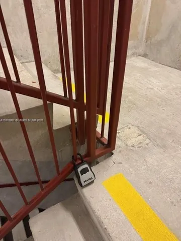 a view of a swimming pool with a sink and a window
