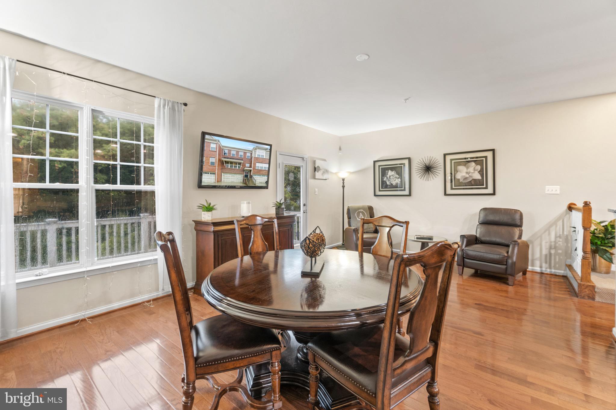 7905 Silver Oak Road Hanover, MD 21076 - Photo 11 of 25 Bright and open living/dining room area