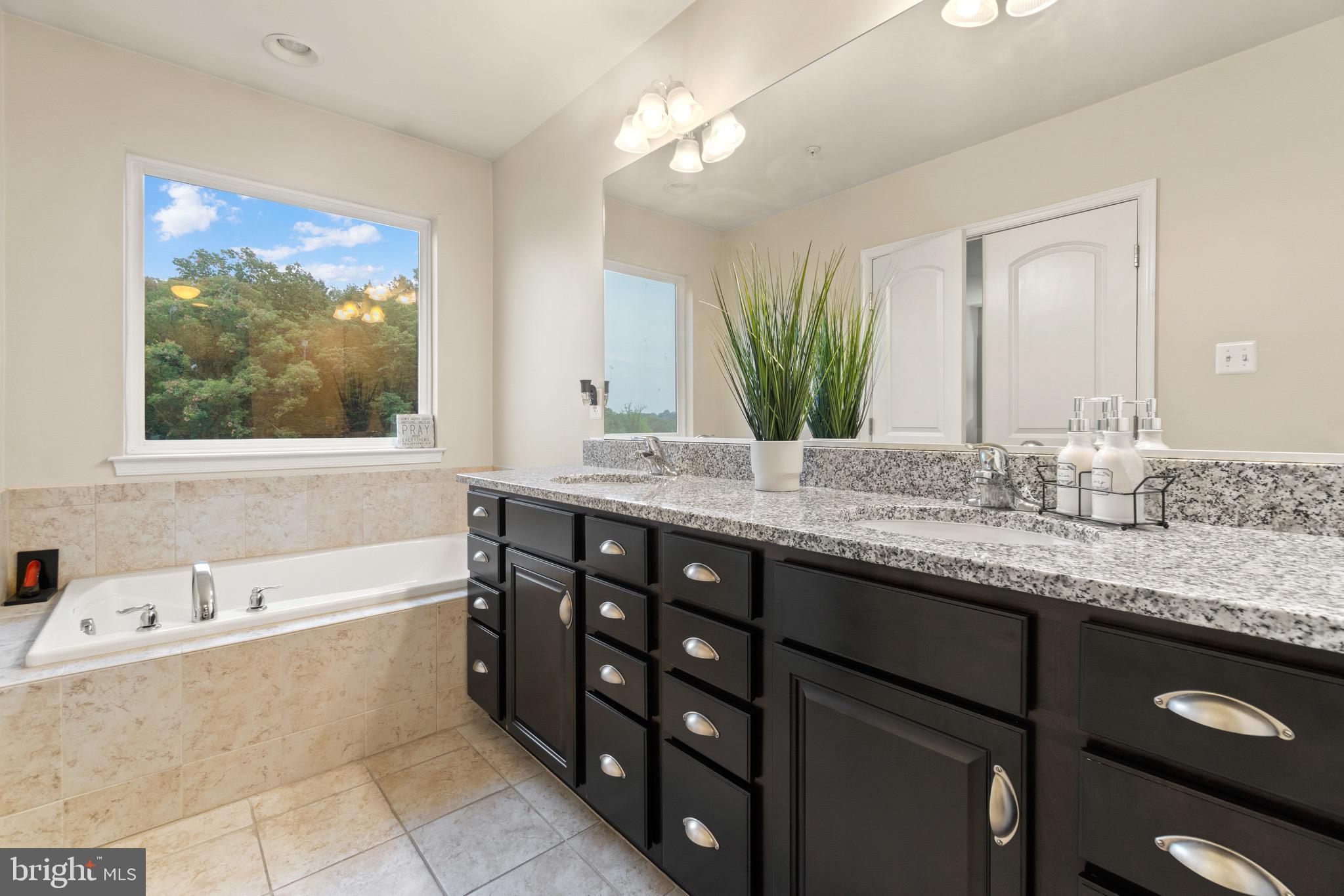 7905 Silver Oak Road Hanover, MD 21076 - Photo 16 of 25 En-suite deluxe bathroom w/ soaking tub