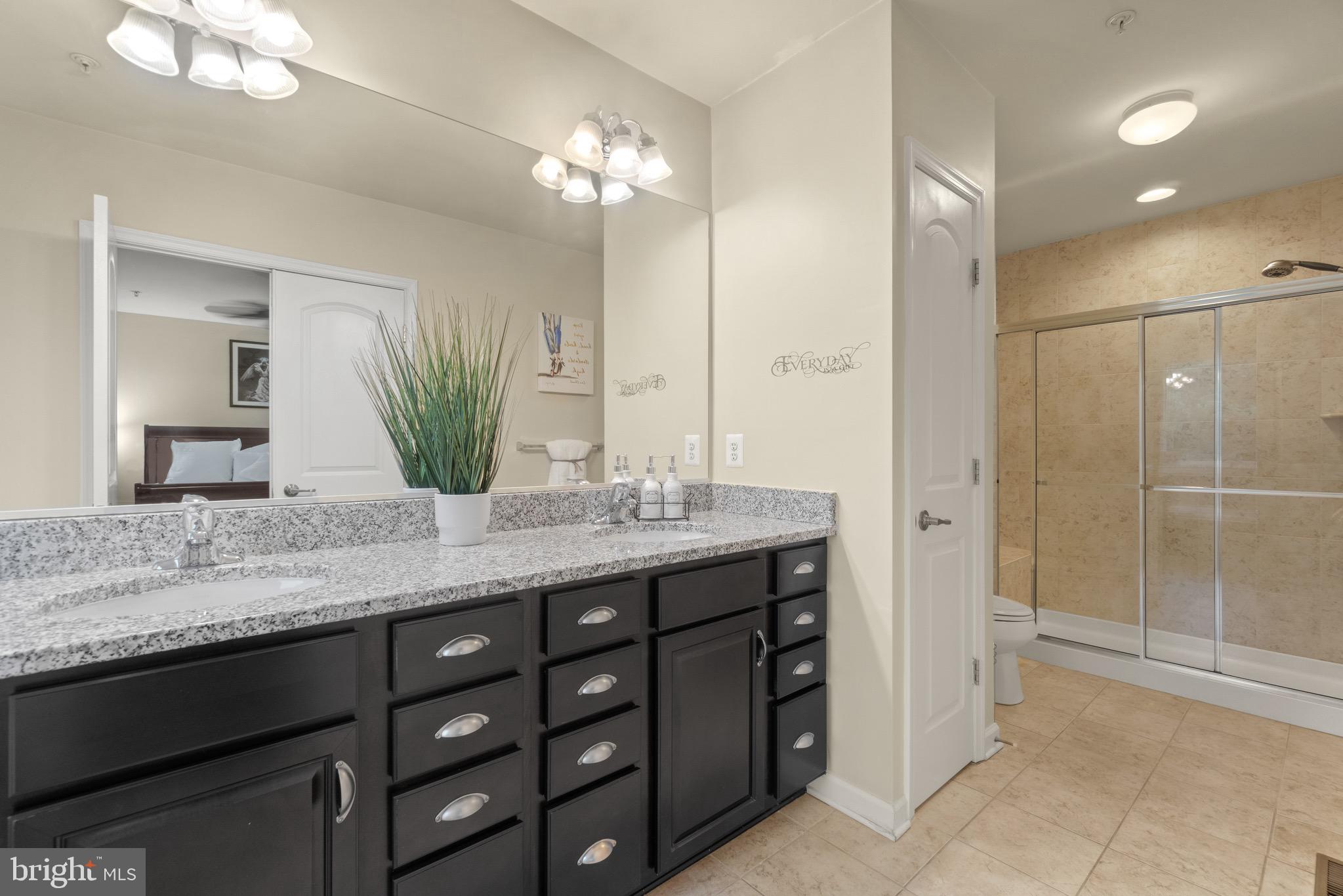 7905 Silver Oak Road Hanover, MD 21076 - Photo 17 of 25 Double vanity and separate walk-in shower