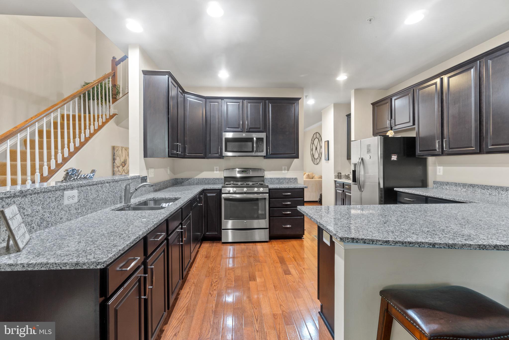 7905 Silver Oak Road Hanover, MD 21076 - Photo 4 of 25 Gourmet kitchen w/ granite and stainless steel!