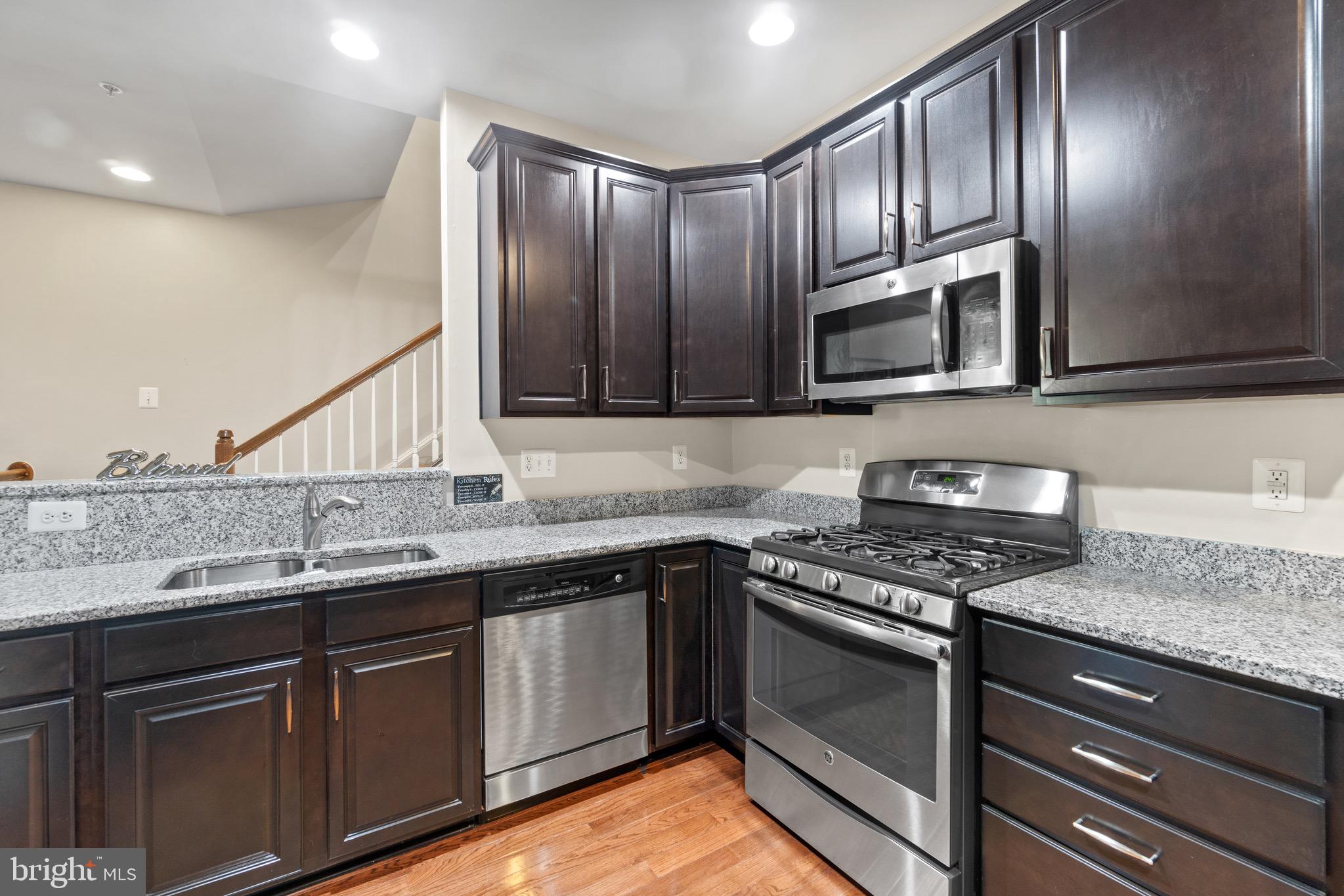 7905 Silver Oak Road Hanover, MD 21076 - Photo 6 of 25 Gourmet kitchen w/ granite and stainless steel!