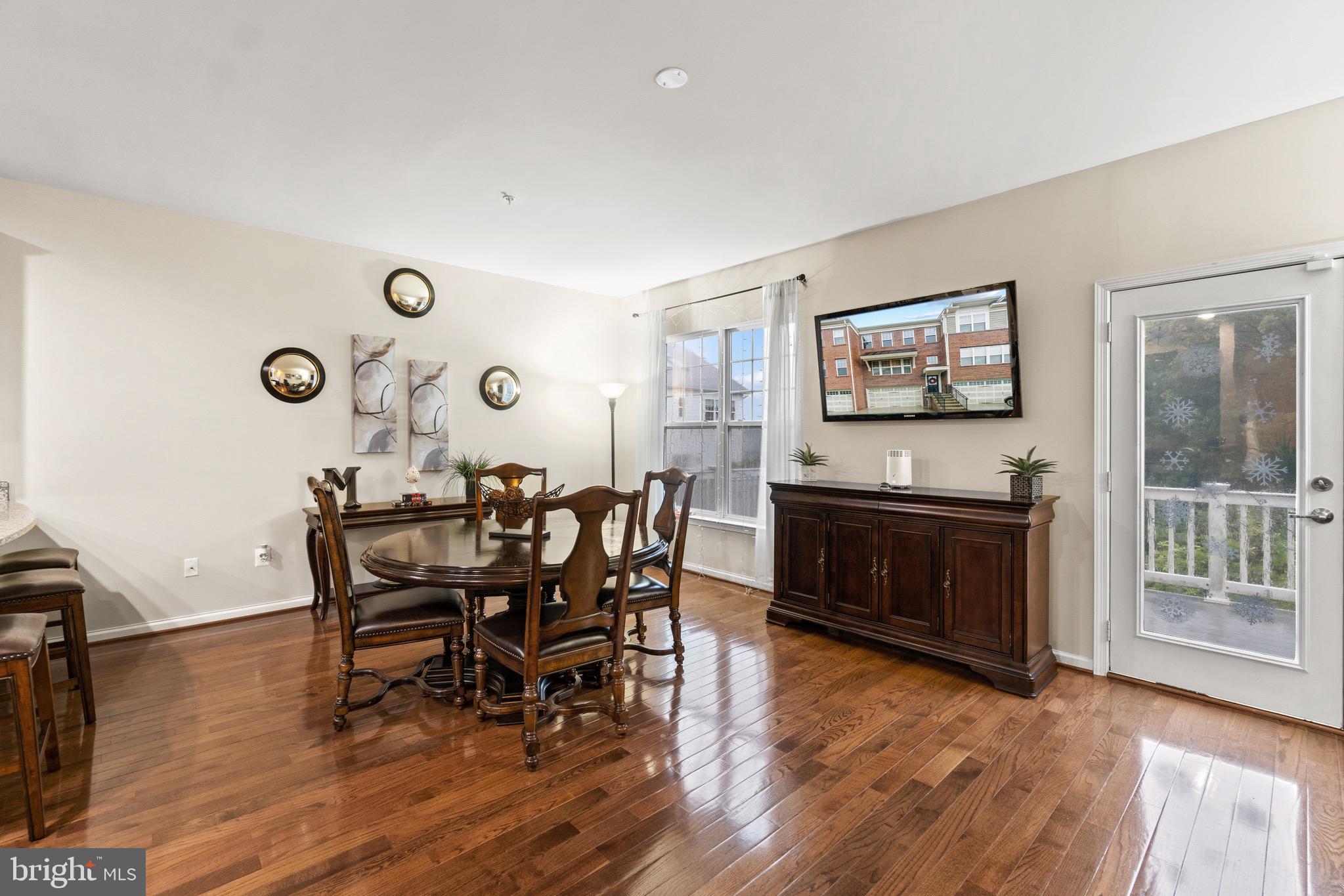7905 Silver Oak Road Hanover, MD 21076 - Photo 9 of 25 Bright and open living/dining room area