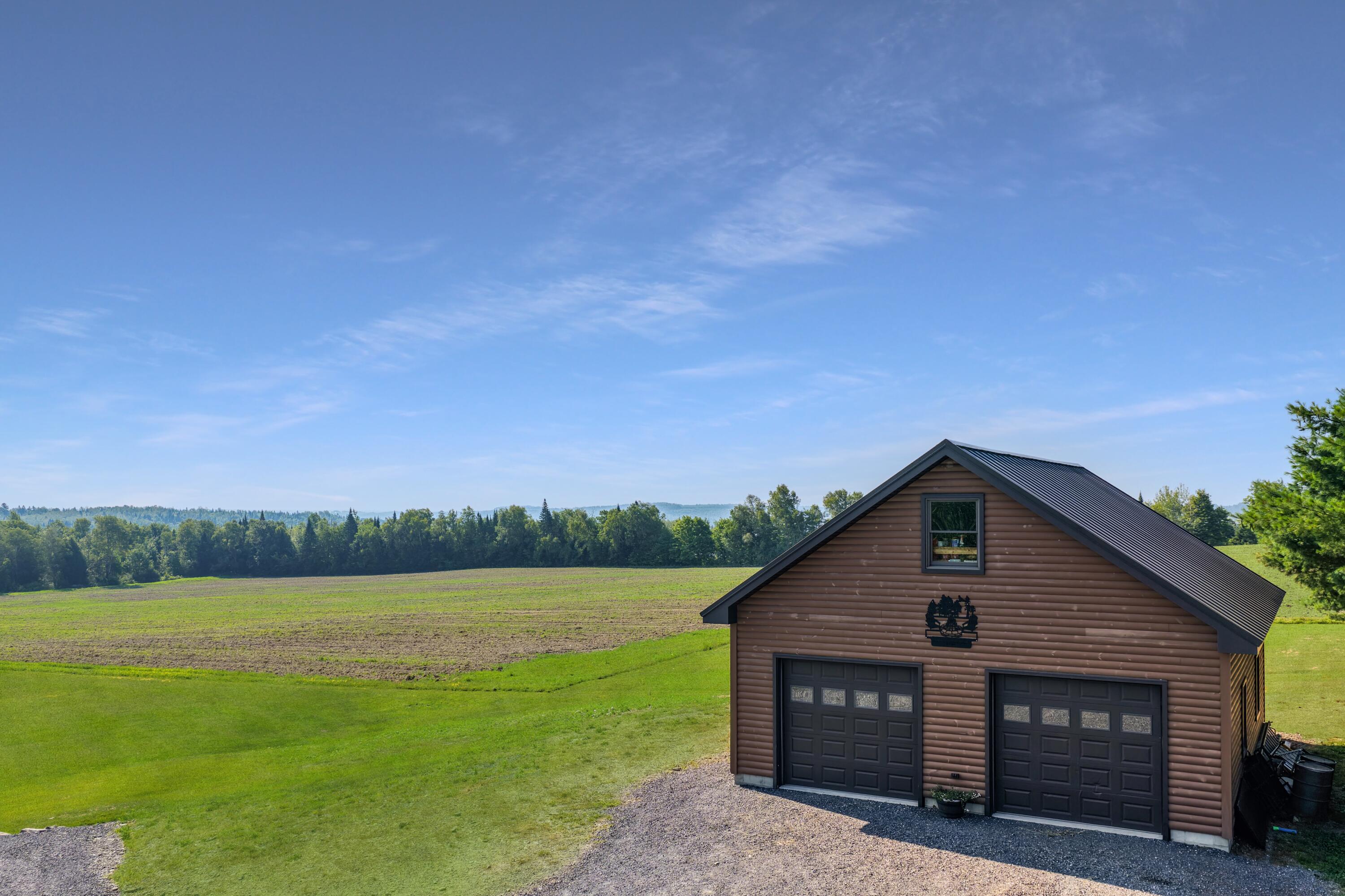 112 Schooland Road New Sweden, ME 04762 - Photo 7 of 64 DJI_20250813212133_0034_D