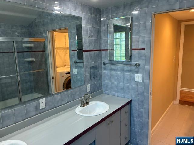 19 Crescent Road Wayne, NJ 07470 - Photo 16 of 26 a bathroom with a sink and a mirror