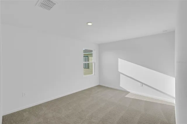 an empty room with a workbench