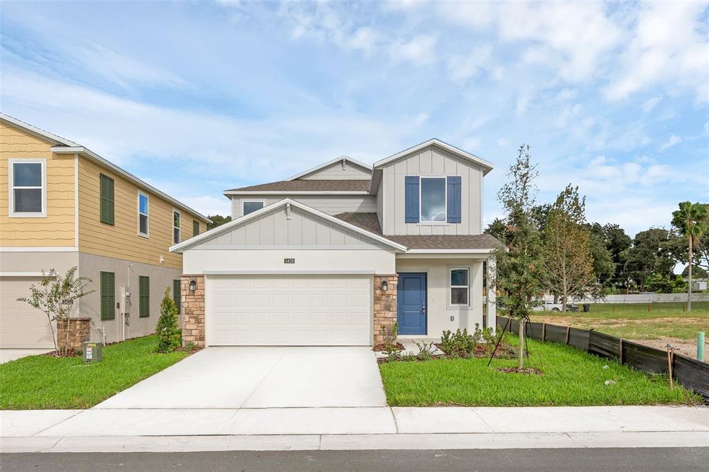 5428 Meadow Walk Drive Davenport, FL 33837 - Photo 3 of 24 a house view with a garden space