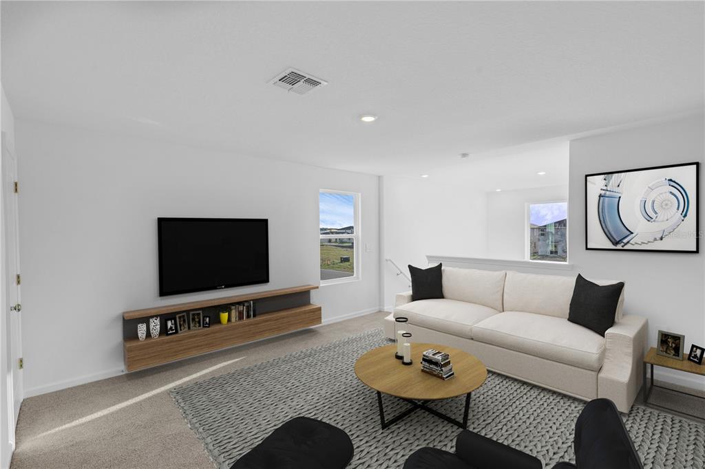 5428 Meadow Walk Drive Davenport, FL 33837 - Photo 5 of 24 a living room with furniture and a flat screen tv