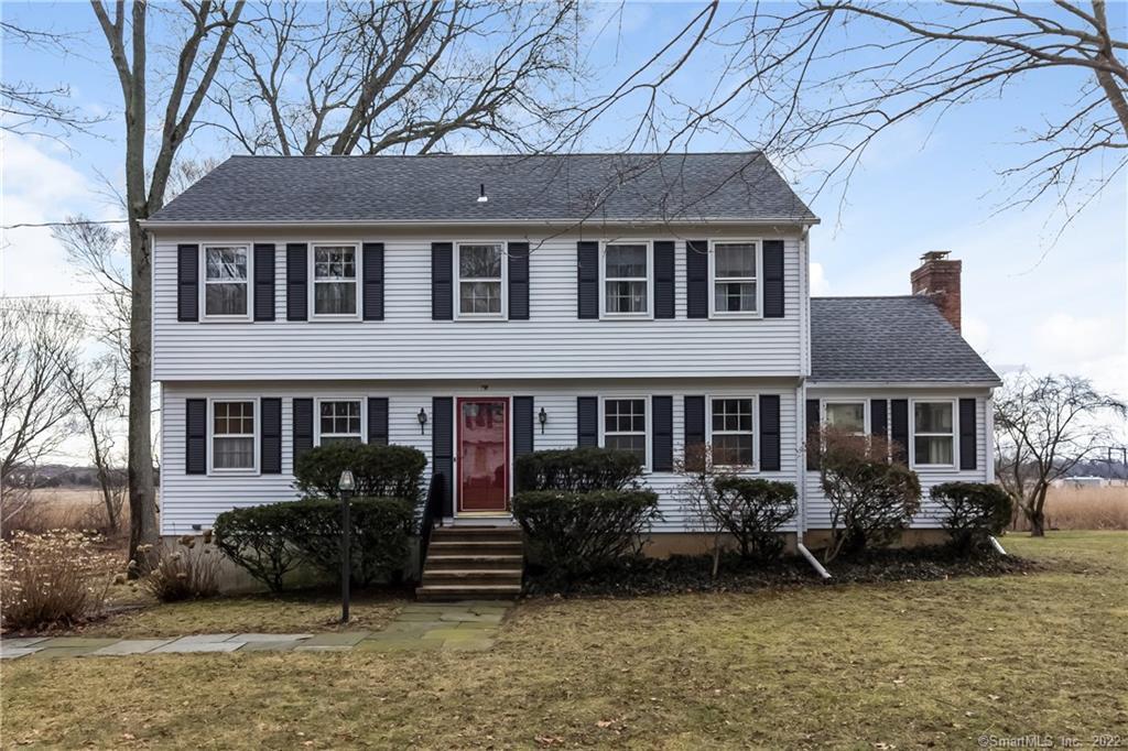79 Horseshoe Road Guilford, CT 06437 - Photo 1 of 1 a view of a house with a chairs in a patio