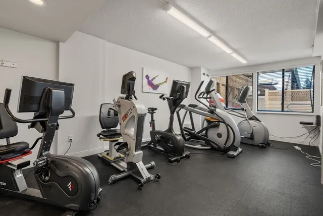 a view of a room with gym equipment